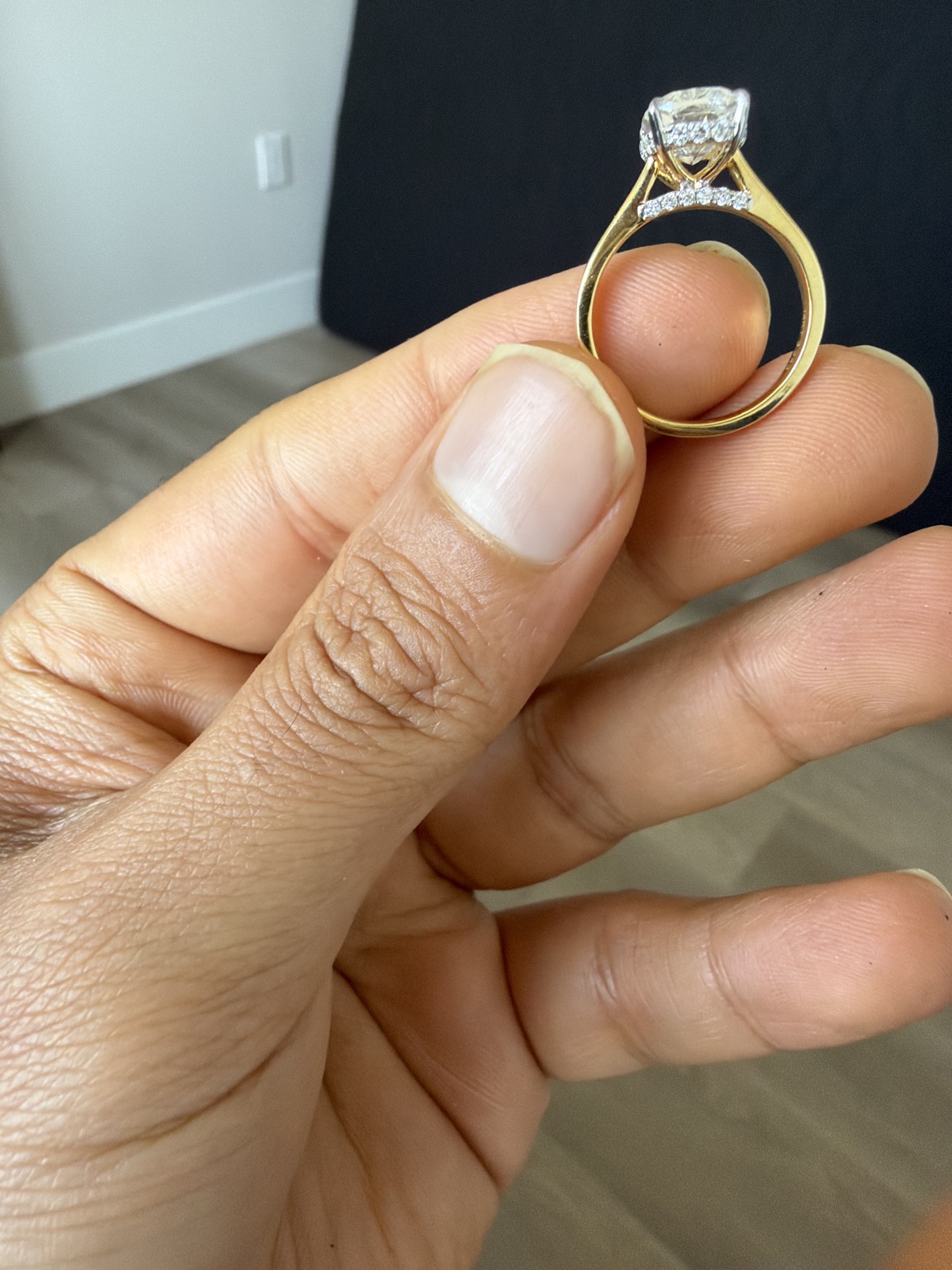Halo-set engagement ring in solid 14K yellow gold, side view