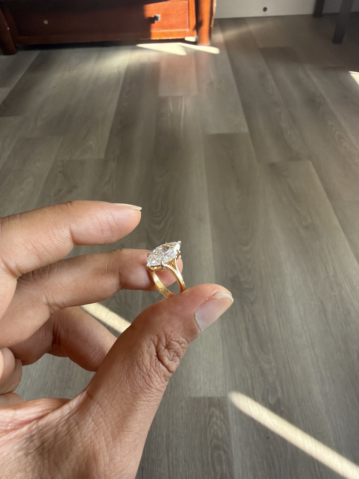 Marquise-cut solitaire engagement ring in solid 14K yellow gold